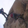 Carl on the crux of Overseer, 5.9