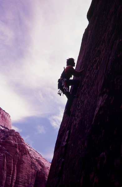 free climbing in Zion, climber Olaf Mitchell, Photo Bruce Sposi