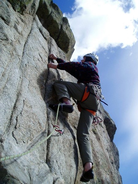 Great tip laybacks lead to the third bolt.<br>
Photo by Luke Clarke.