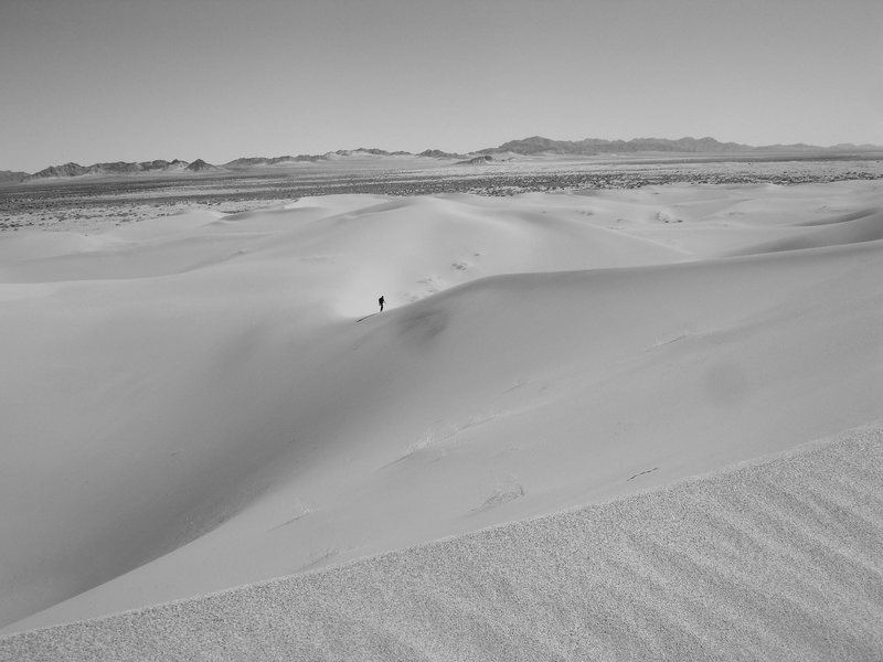 Exploring the peaceful Mojave desert 2/26/08.<br>
<br>
Jonny coming up the Cadiz dunes.
