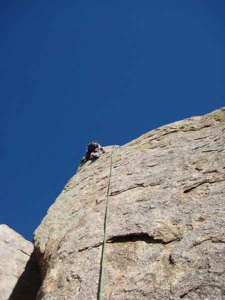 Dean topping out the Right tower, climbing Green Snake.