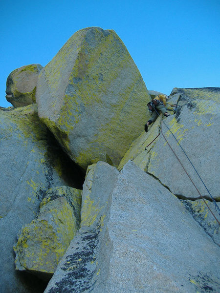 Mike Schneiter climbing the fourth pitch of Imaginary Voyage.
