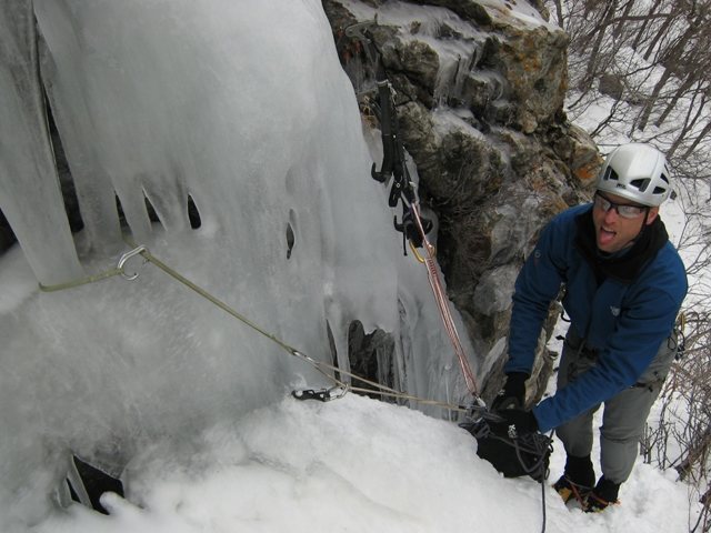 Belay position for the start of the route. Careful of the yawning void to the climber's left.