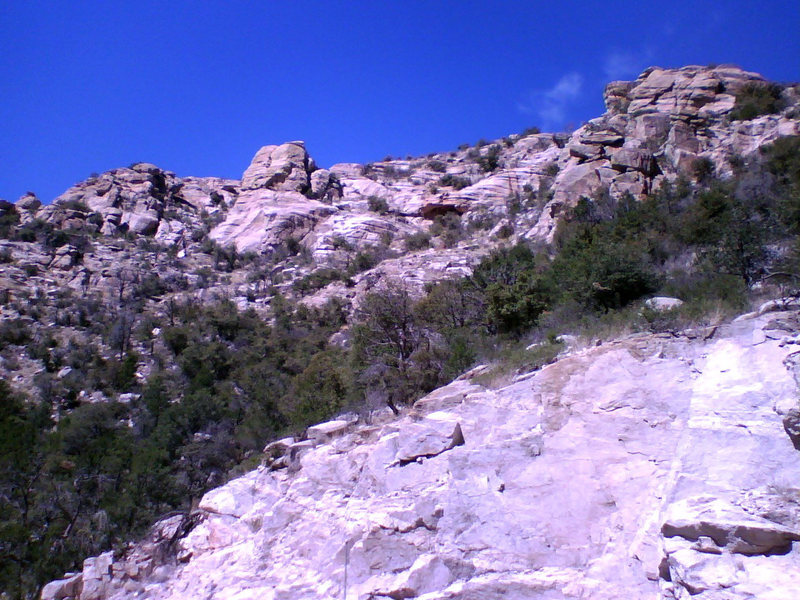 Wailing Wall from the Chimney Rock pullout. The cave to its left isn't a great as it looks. There's a 50' traverse problem/route, but that's about it.