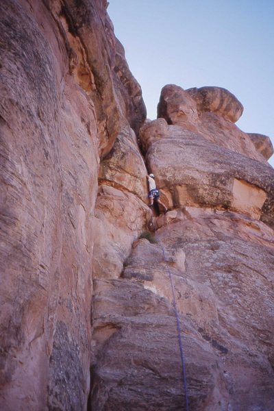 Charles Vernon in the crux at the top of pitch 2, Otto's Route.