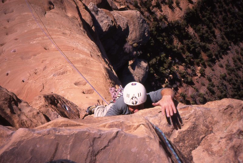 Carl Pelletier tags the top of Otto's Route, Independence Monument.