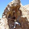 Working a cool stemmy V0 at the Summit Boulders in Hueco Tanks.