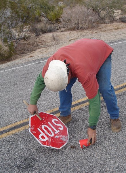 Sheesh...tarantulas can't read.<br>
<br>
Clearing a roadway.<br>
<br>
I can't believe we had to stop for this. Oh well, at least the gentleman was very friendly. <br>
<br>
I love desert roads!