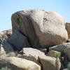 Every rock has a twin?  [[Rastafarian]]106087531 looking boulder
