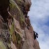 Unknown climber following the last pitch. Photo taken from Psychosis.