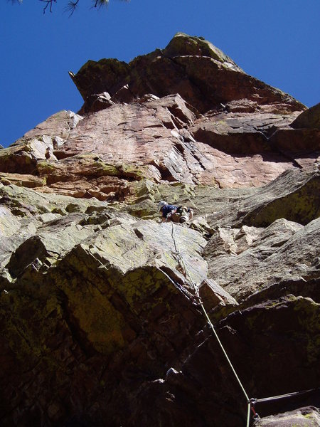Luke on the slab on P1. The route goes right from there and then either up the black crack on the right (Old Farts, 10d), or back left to the crack above Luke (standard 2nd pitch, 5.9). The crack further left is the 5.9 second pitch of Neurosis.