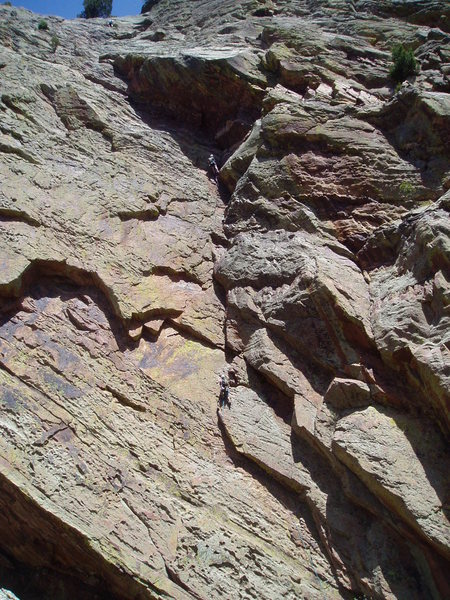 Unknown climbers on the 5th and 6th pitch. One party is on the top/6th pitch. The leader of another part is most of the way up the 5th pitch.