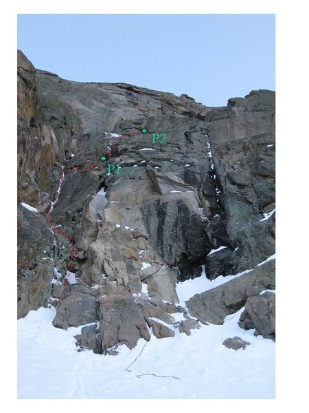 View looking up from the start at P1 & P2. The rappel line is the obvious, black streak in the LFD.