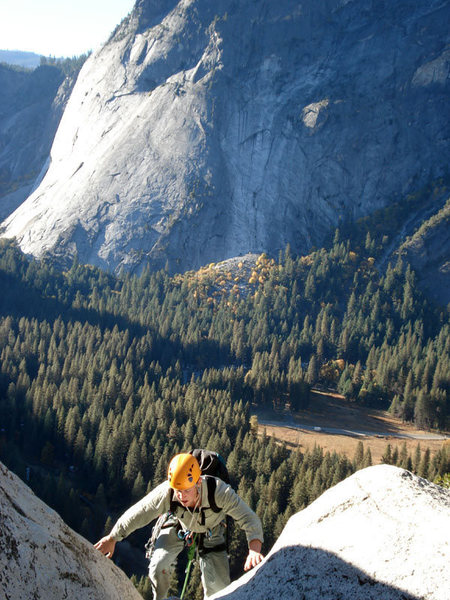 Daren coming up to the ledge below the slab crux/pendulum pitch...
