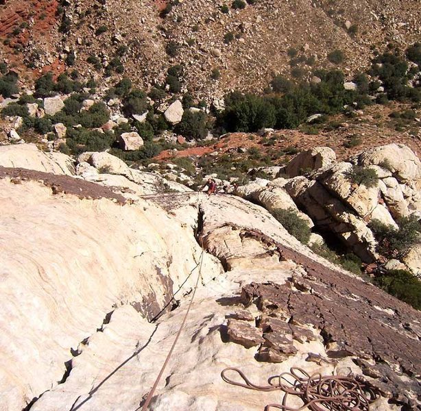 Approaching the belay position to the left of the midway headwall of Sunset Slab.