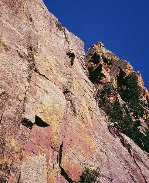 Tony high up in 5.9 territory on Zipcode (5.11-) on Eldo's West Ridge This is well above the crux and is great climbing on great rock with great protection. Photo by Stefanie VanWychen, 3/08.