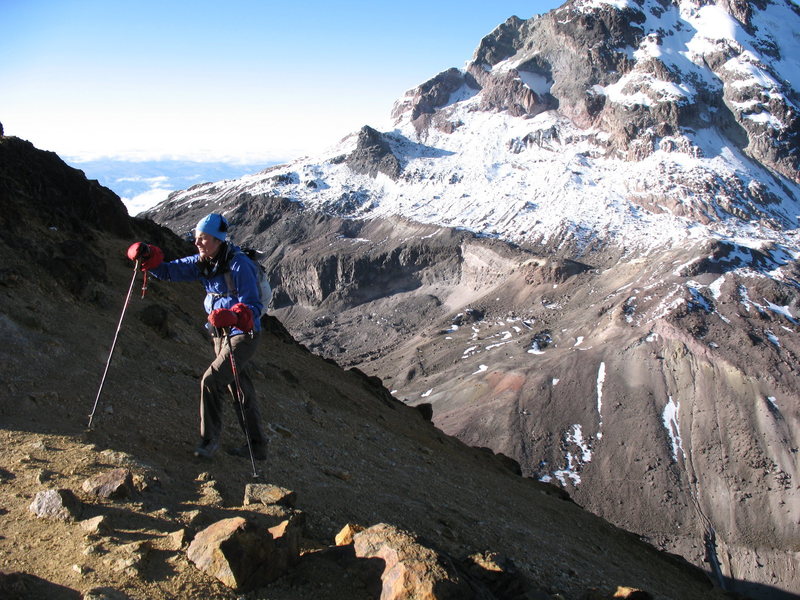 Nancy Bell heads up the first part of the ridge on the Normal Route as Illiniza Sur looms large in the background.