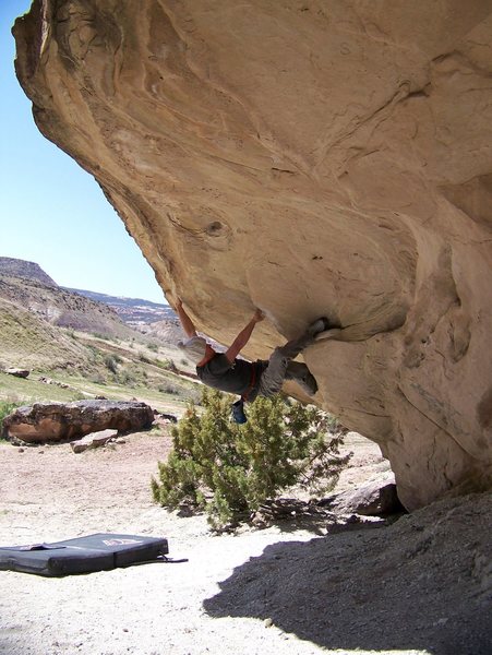 Pulling on the overhang.