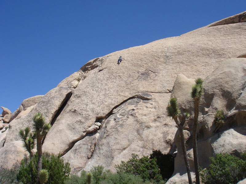 Jason Partin searching for Klingons amidst the small indentations of the upper slab, high above the last pro.
