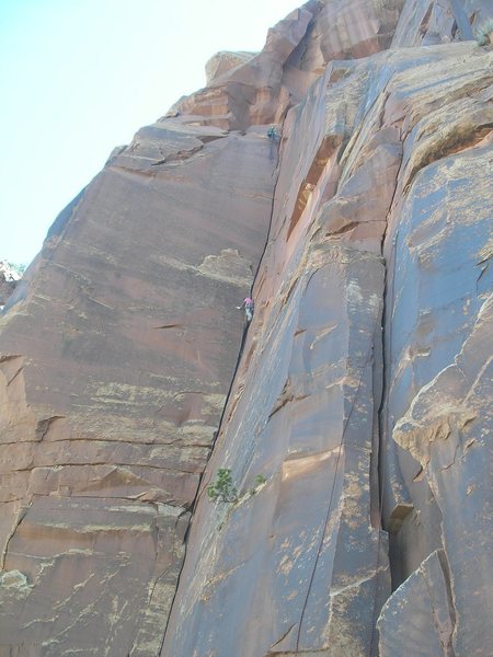 Chad and Tony on Sabattical.  In the foreground is the unknown 5.9 route (with rope hanging).  Photo by Dorothy.