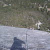 A look down at the polished granite (and my irregular shadow) of the slabby left finish.