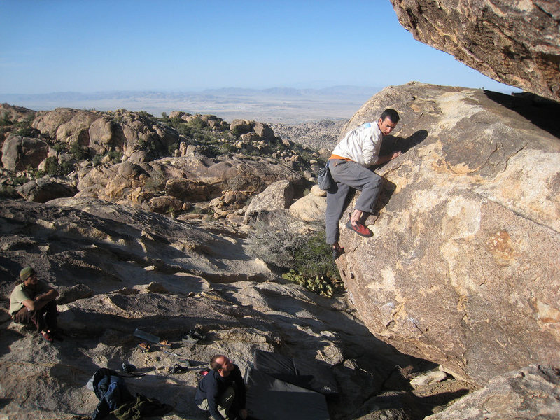 zep topping out some V2 I can't remember the name of on the eclipse boulder.