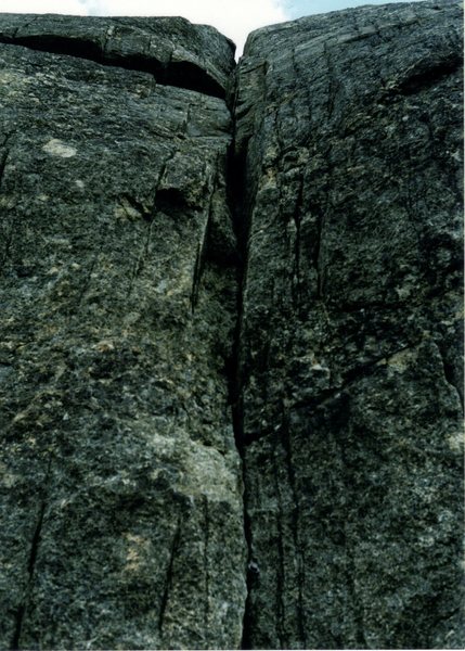 The obvious crack with the lag bolt. The bolt has no purpose except to make us scratch our heads.