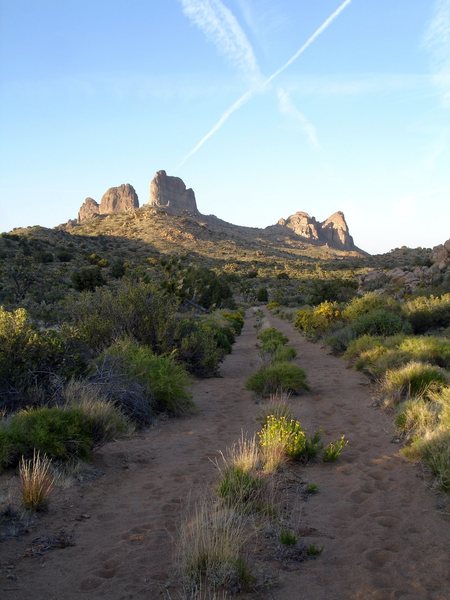 Looking back at Castle Peaks on the hike out on a beautiful late evening. <br>
<br>
But the adventures of Jonny, and Gigi wasn't over yet! We decided to try out another long stretch of dirt road that rides on an old railroad bed that will get us to Searchlight, Nevada. On the bumpy ride out, we enjoyed our snack of smoked cracked pepper salmon on wheat thins, homemade chocolate chip cookies, and Perrier; yummy! Life is good! <br>
<br>
Anyway, we did make it in our 2WD truck; the road was tricky in quite a few spots, but worth it; beautiful old mining remnants along the way!<br>
<br>
I love the Mojave desert; so much to explore.<br>
<br>
4/30/08