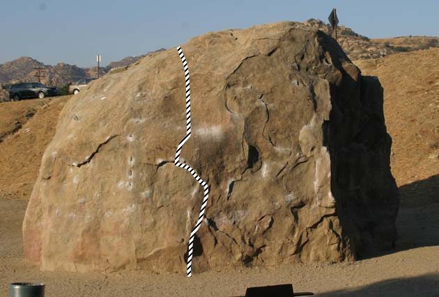 Undercling problem. 5.10c or V0+. Uses chipped hold to mantel<br>
<br>
Photo by Chris Owen, I just drew the route in.