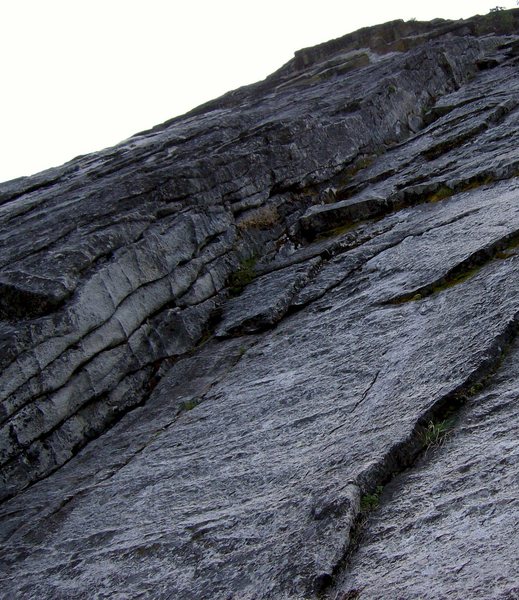 Before: Scary loose blocks and potential "death flake" on Pitch 1.