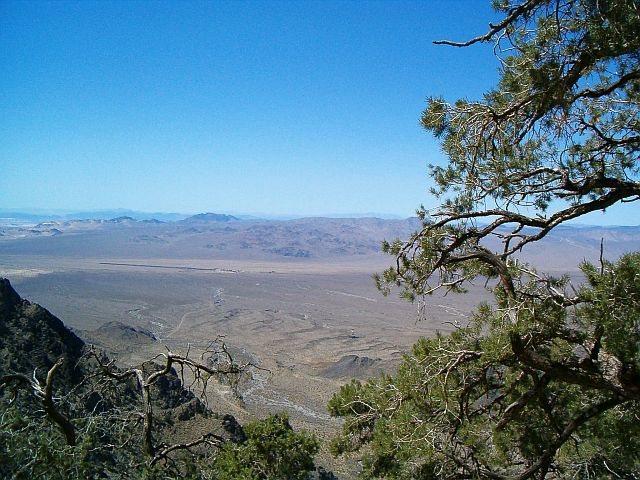 Kelso Depot and approaching train from the Providence Mountains, Mojave NP