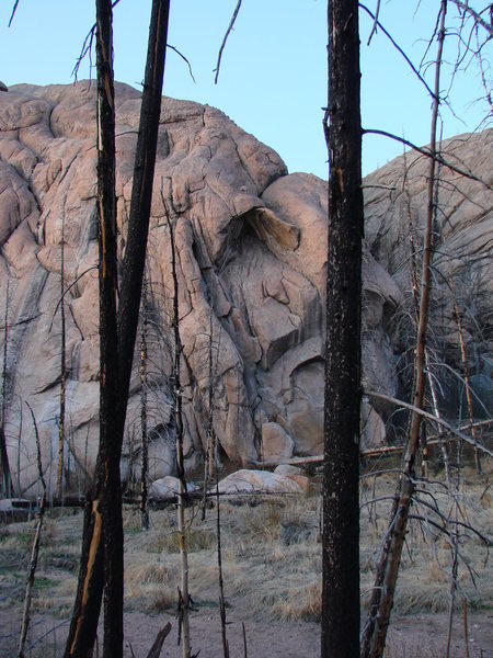The route(s) follow easy hand cracks to the dark alcove and over.