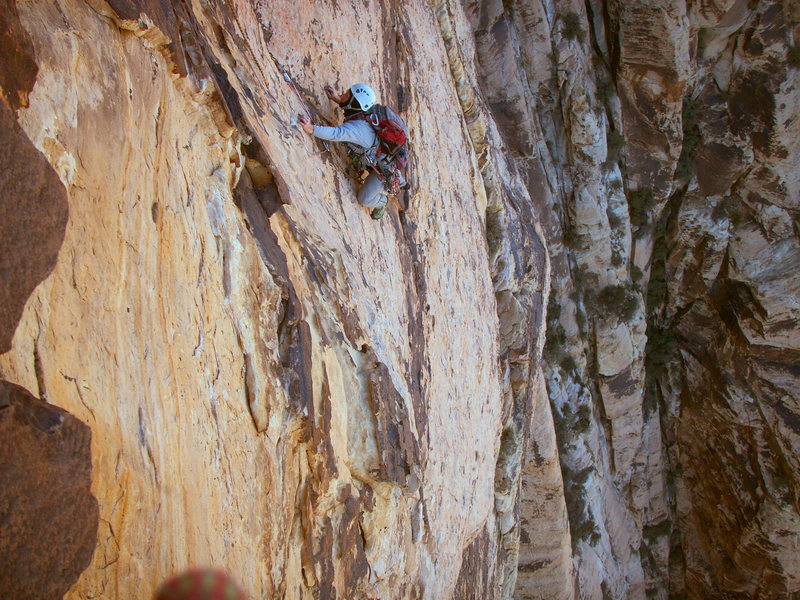 Drew finishing up the long traverse on pitch 6.