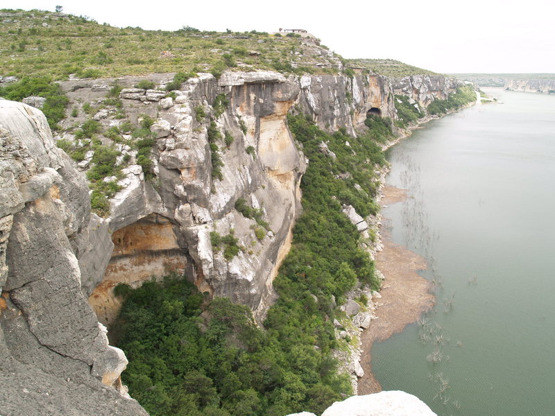 View of the Pecos River downstream from Continental Ranch. This pic is typical of the shorelines of the Pecos, Devil's, and Rio Grande: miles and miles of limestone.