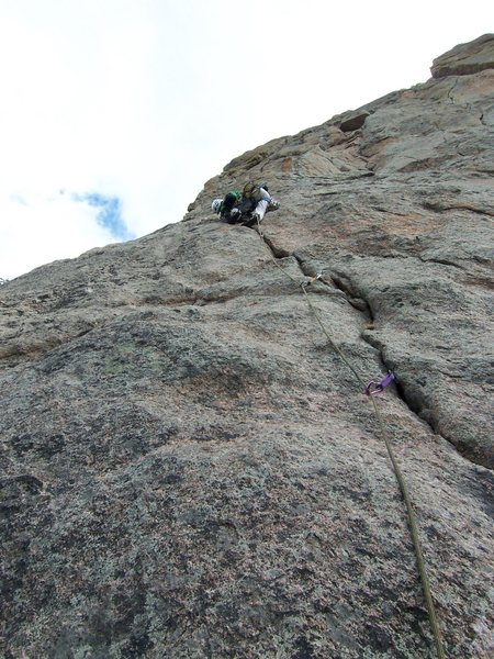This is the recommended 5.9 start to P1. There are a few runouts (~15ft) above good gear on incut holds. This is a great pitch with a fun leaning crack and cool face climbing.