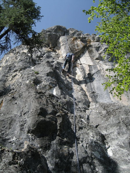 Brian Mutschler rappelling steep face of Crackbaby 5.9+