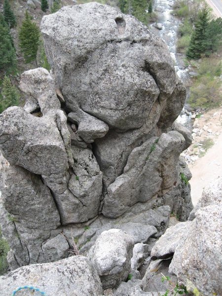 Go past bolts, up thru chimney to belay here to avoid rope drag on P2.