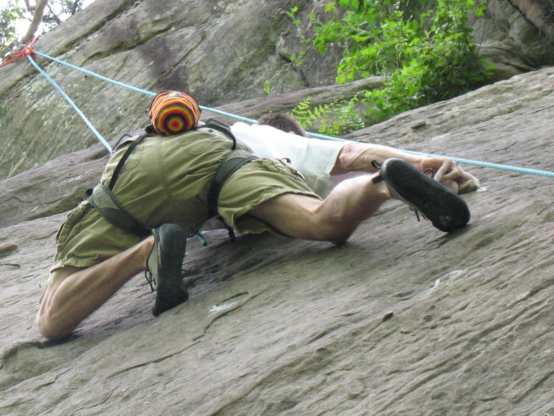 John Knoernschild just above crux move. <br>
<br>
photo by Angie Olson