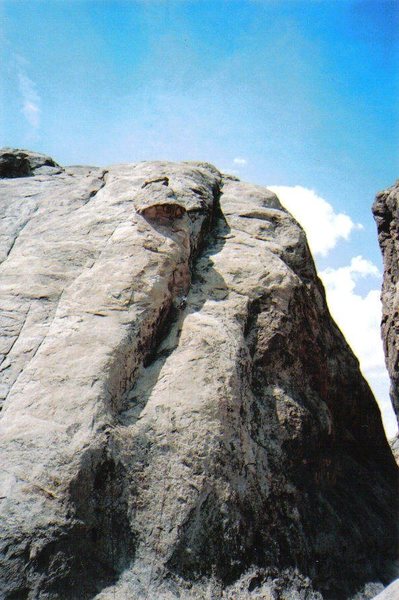 Climber near the top of the first pitch. View to full picture size .