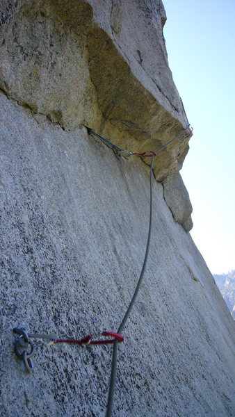 Crux pitch of Freeblast/ it really is not rated R. Fixed pin followed by two fixed stoppers and a bomber pin scar finger pod over lip.