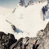 Bob Dodds and Wendy Weiss third-classing the lower Kain Route on Bugaboo Spire. 1974.