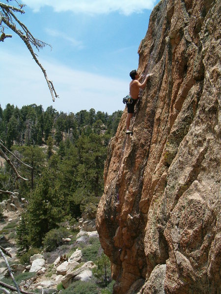 Bryan high above the pines and cruising on Jet Blue (5.11a), Crafts Peak
