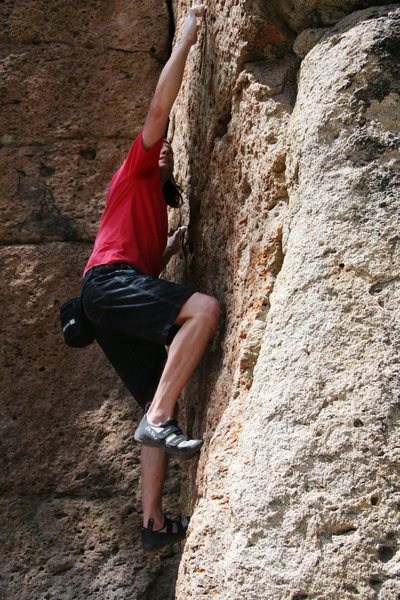 Pulling through on the small crimps on Problem J, V1