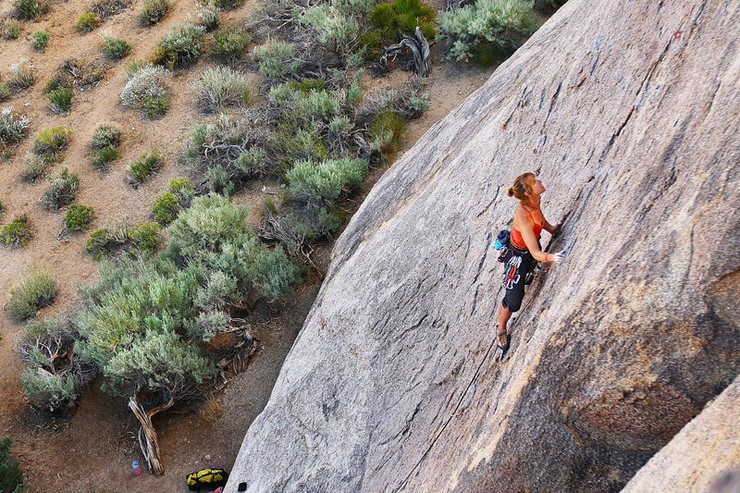 Castles in the Sand: Kari Castle, world champion hang gliding and paragliding pilot, ponders the Long Wall in the Alabama Hills.