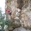 Vince Bates at one of the crux moves below the roof crux.