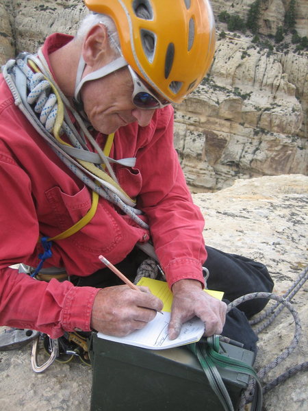 James G. signing the summit register he brought up for the climb.