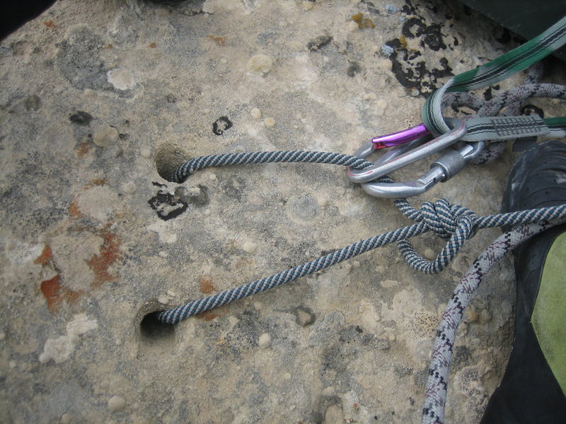 V-thread anchors on the summit.
