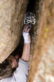 Plugging in at the crux...getting the piece deep will make things easier.