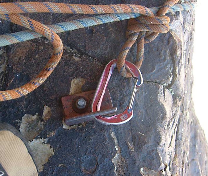 Mystery bolt: at the top of the third pitch, we found bail slings on this nicely placed old bolt.