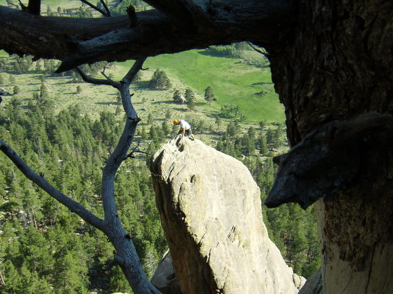 Unknown climber on top of Bookmark Pinnacle.  Lumpy Ridge Colorado.  June 29th 2008. 